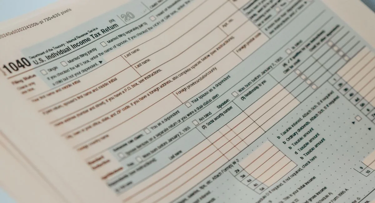 Detailed close-up image of a U.S. 1040 Individual Income Tax Return form, ideal for finance-related content.